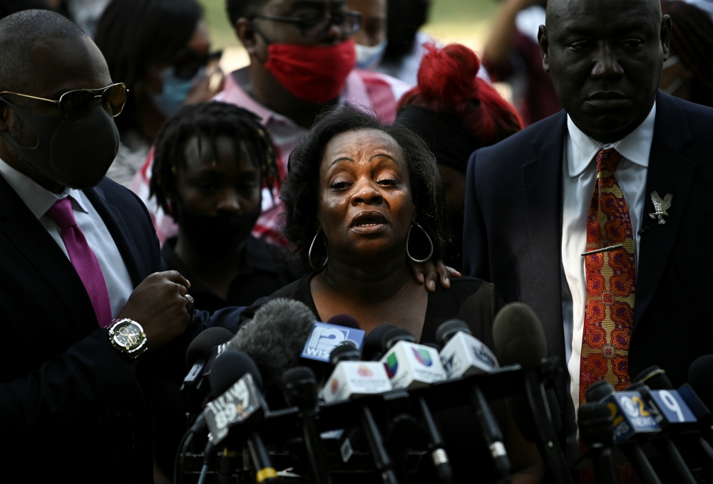 Julia Jackson (center), mother of Jacob Blake, who was shot several times in the back by a police officer, speaks during a press conference outside the Kenosha County Courthouse in Kenosha, Wisconsin, Aug. 25. (Newscom/Reuters/Stephen Maturen)