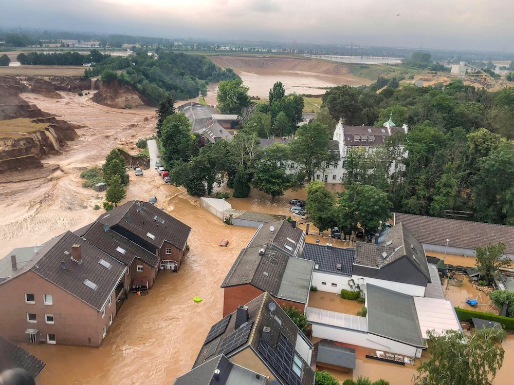 An aerial view shows flooding in Erftstadt-Blessem, Germany, July 16, when record rainfall caused dams to burst and rivers to overflow into towns and streets across western Germany and Belgium, as well as parts of the Netherlands, Switzerland and northern