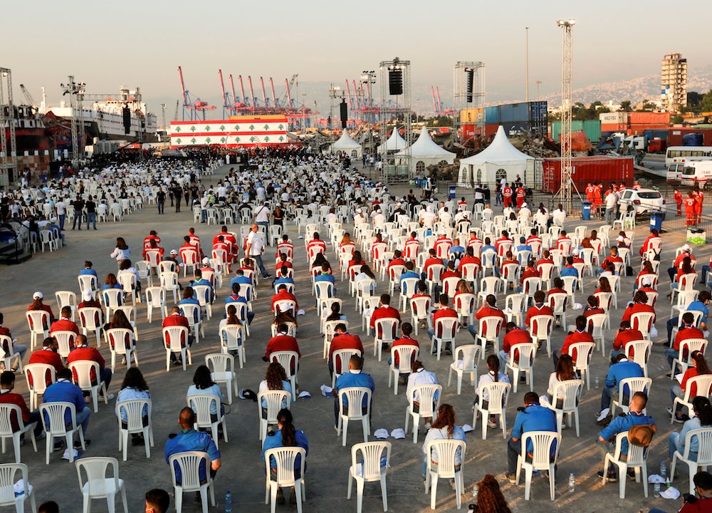 People attend a Mass celebrated by Cardinal Bechara Rai, Maronite patriarch, Aug. 4 to mark the one-year anniversary of Beirut's port blast. The explosion killed more than 200 people, injured more than 6,000, and displaced more than 300,000. (CNS photo/Mo