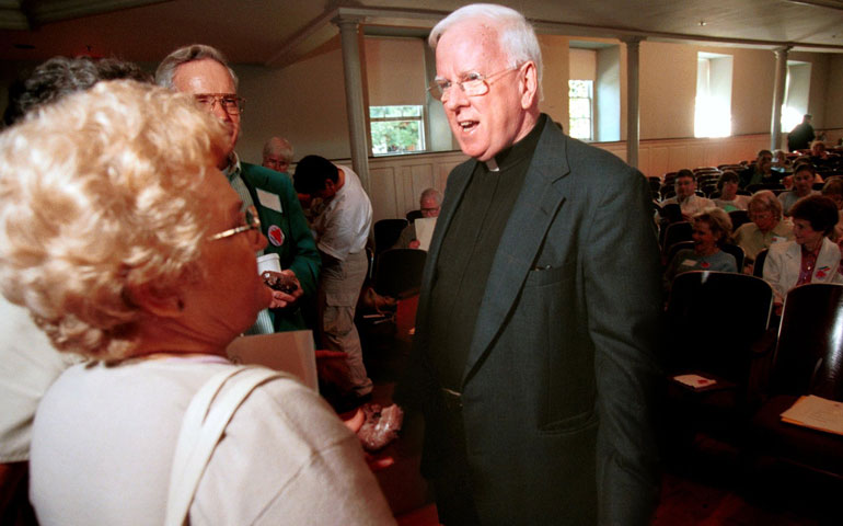 In September 2000 in Haverford, Pa., Fr. Robert Nugent, right, visits with people attending a talk he presented with Sr. Jeannine Gramick about their silencing. (Newscom/KRT/Dan Z. Johnson)