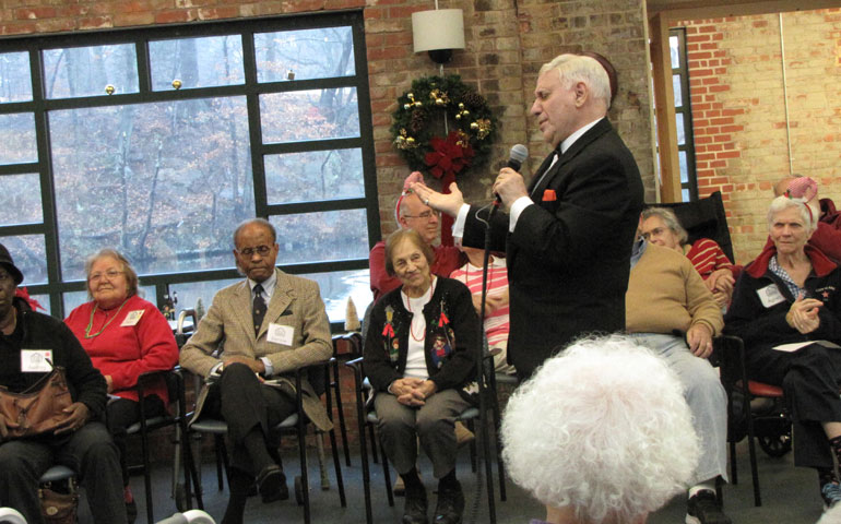 Ol' Blue Eyes, or Jerry Cardone, sings at the River House holiday party Dec. 23. (Melissa White)