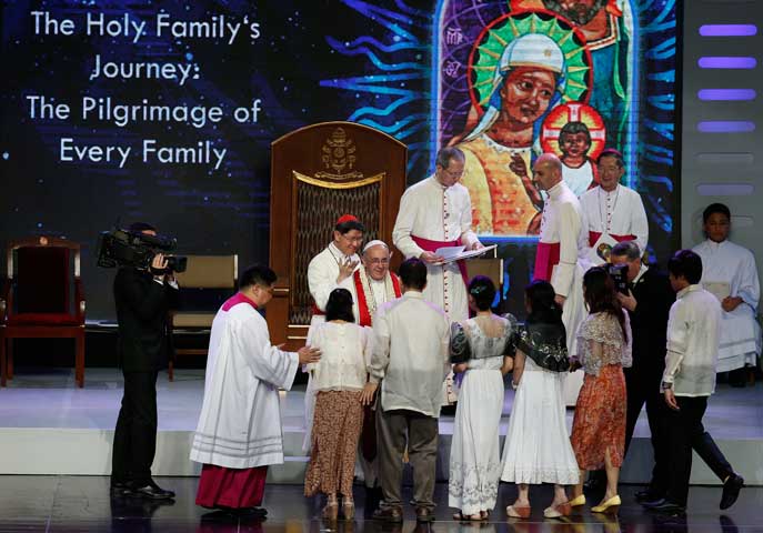 Pope Francis greets family members during a meeting with families in the Mall of Asia Arena in Pasay City, Philippines, Jan. 16. (CNS/Paul Haring)