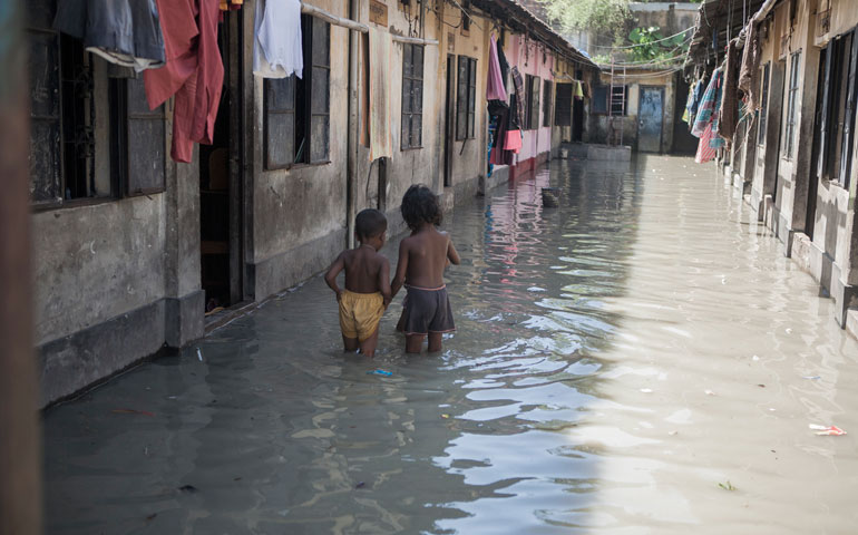 Climate change has begun to take a toll on Chittagong, Bangladesh, where tidal surge can affect the city as often as twice a day, resulting in frequent flooding. (Newscom/Sipa USA/NurPhoto/Jashim Salam)