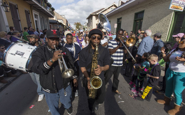 A brass band performs during the Mystic Krewe of Barkus dog parade in the French Quarter of New Orleans Jan. 31. (Photos by Newscom/Reuters/Lee Celano)