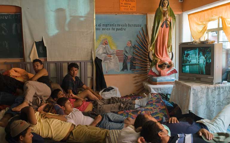 People pack a room at the St. Juan Diego Migrant House, a shelter and sanctuary for travelers, in the Tultitlán suburb of Mexico City, in 2011. (CNS/Keith Dannemiller)