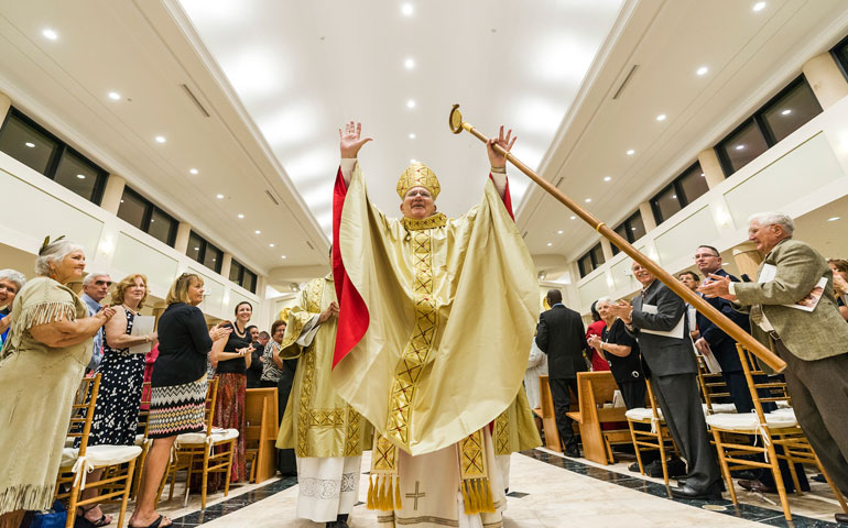 Bishop Robert Lynch of St. Petersburg, Fla., concludes the dedication of the newly renovated Cathedral of St. Jude the Apostle Sept. 12. (CNS/Ed Foster Jr.)