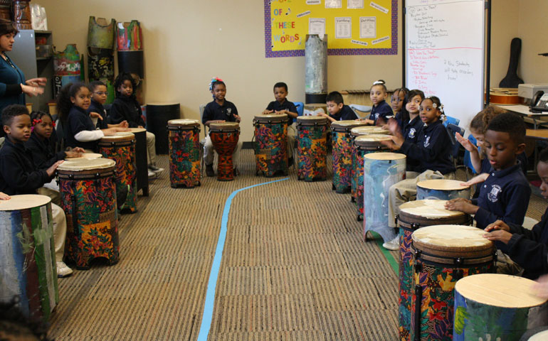 Grade school students in the Messmer Catholic Schools system take a music class. (Photos courtesy of Messmer Catholic Schools)