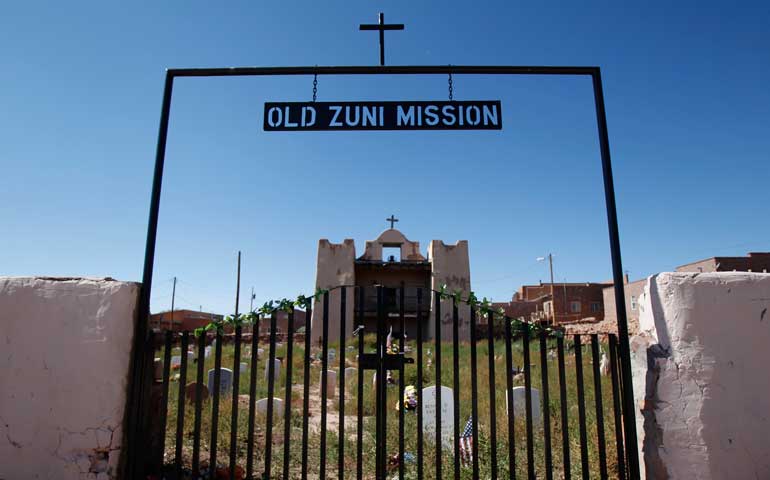 A sign frames the Old Zuni Mission on the Zuni Pueblo Indian reservation in New Mexico. (CNS photos/Bob Roller)