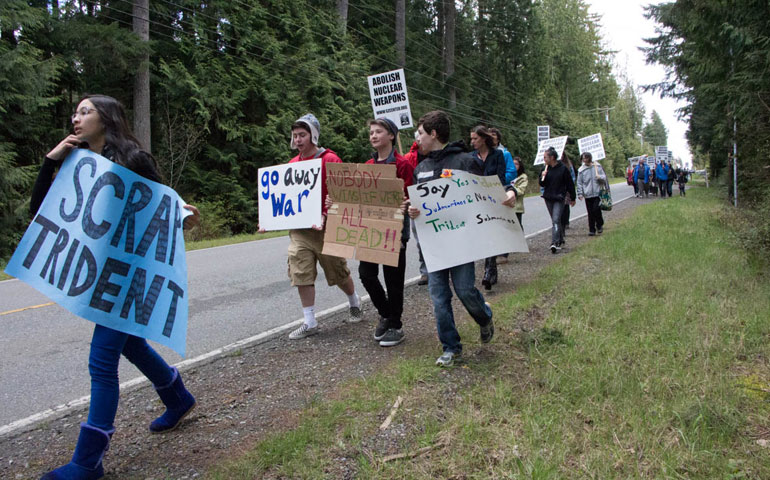 Youth from St. Leo Parish in Tacoma, Wash., walk to the Naval Base Kitsap-Bangor April 14. (©Robin Sherwood)
