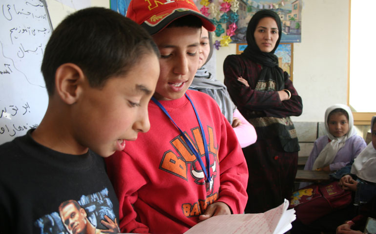 In 2007, students read aloud at a rehabilitation center in Kabul, Afghanistan, for youths who have experienced trauma and violence. (CWS/Chris Herlinger)
