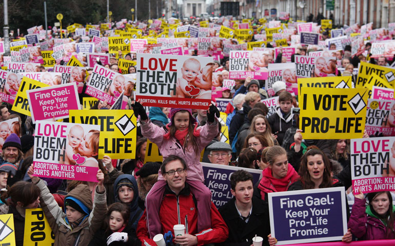 People gather for a pro-life vigil outside the Irish parliament in Dublin Jan. 19. (CNS/John McElroy)