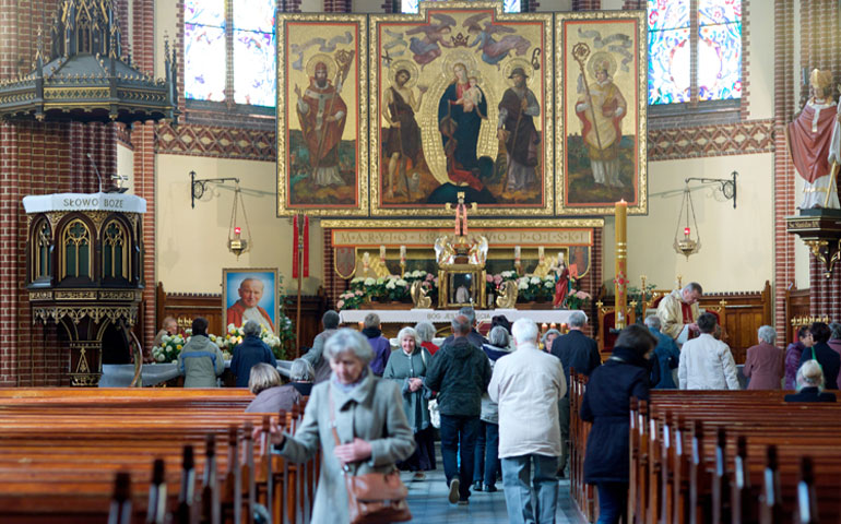 Catholics in the Church of John the Baptist in Szczecin, Poland, in May 2014 (AP Images/dpa/picture-alliance/Peter Endig)