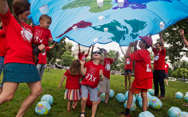 Kids participate in a “play-in” in support of the EPA’s Clean Power Plan July 9, 2014, in Washington, D.C. (CNS/CQ Roll Call/Tom Williams)