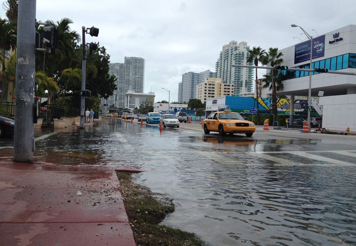 Flooding at Alton Road and 10th Street is seen in Miami Beach, Fla., on Nov. 5, 2013. (Newscom/Reuters/Zachary Fagenson)