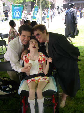 Parents Evander and Fotini Lomke with daughter Elizabeth celebrate Mom’s graduation.(Connie Papoulas)