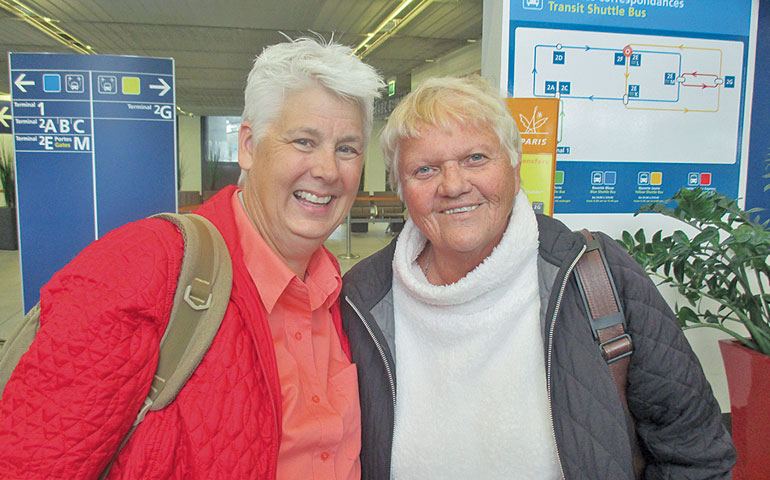 Honour Maddock, left, and Kathleen Kane at the airport on the way to a Rome pilgrimage and a special audience with Pope Francis (Courtesy of Francis DeBernardo)