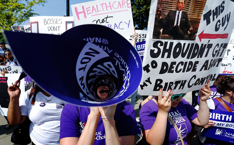 Supporters of abortion and contraceptive rights demonstrate outside the U.S. Supreme Court in Washington June 30. (Reuters/Jonathan Ernst)