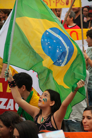 Thousands of protesters march toward Maracana stadium in Rio de Janeiro June 30 during the Confederations Cup. (Newscom/EPA/Marcos Arcoverde)