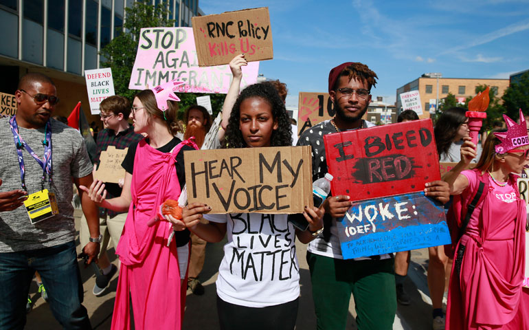 Protesters march July 17 in Cleveland before the 2016 Republican National Convention in that city. (Newscom/Polaris/Jeremy Hogan)