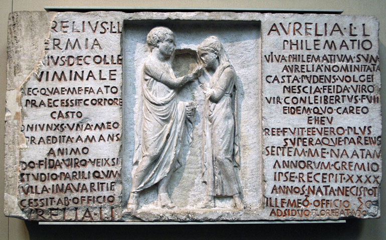 A Roman funerary relief dating to 80 B.C. shows a married couple. (Newscom/Prisma/Album)