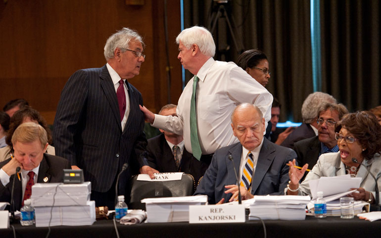 Rep. Barney Frank, standing at left, consults with Sen. Christopher Dodd during the House-Senate conference on a comprehensive financial regulatory overhaul bill on June 23, 2010. (Newscom/Congressional Quarterly/Scott J. Ferrell)