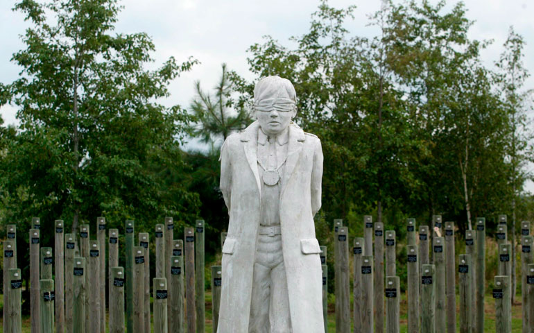The “Shot at Dawn” memorial at the National Memorial Arboretum in England is modeled on Pvt. Herbert Burden, who was shot at the age of 17 by the British Army for desertion. (Newscom/EPA/ Sam Stephenson)