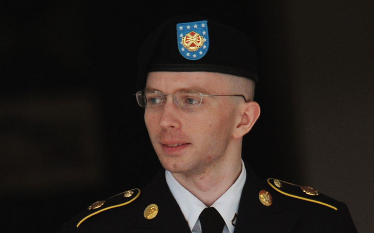 Army Pfc. Bradley Manning is escorted from court July 25 in Fort Meade, Md. (Getty Images/AFP/Mandel Ngan)