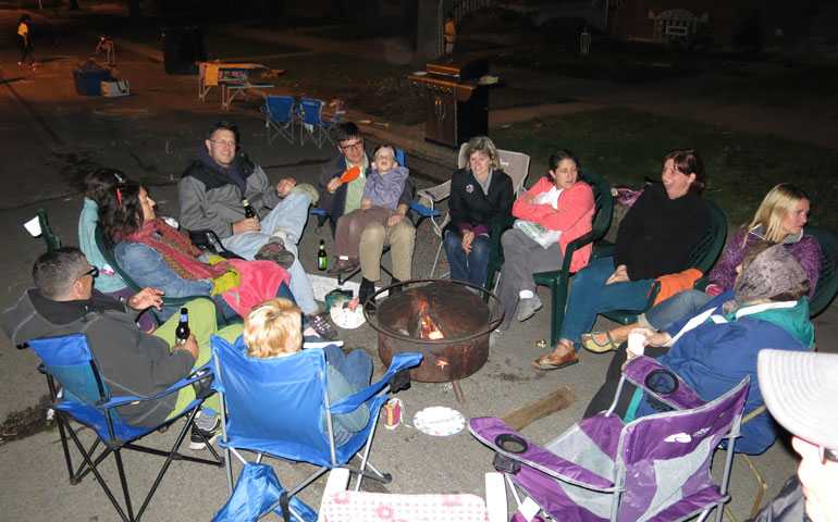 Heidi Schlumpf's neighbors block off the streets for an annual block party that includes food, games for kids and a campfire. (Kevin Streicher)