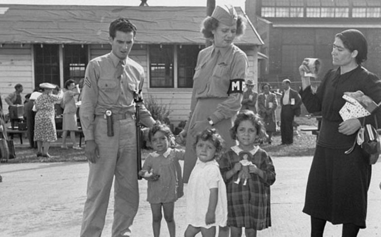 American military police help three little girls find their parents at the Fort Ontario Refugee Center in Oswego, N.Y., in 1944. (U.S. National Archives and Records Administration)