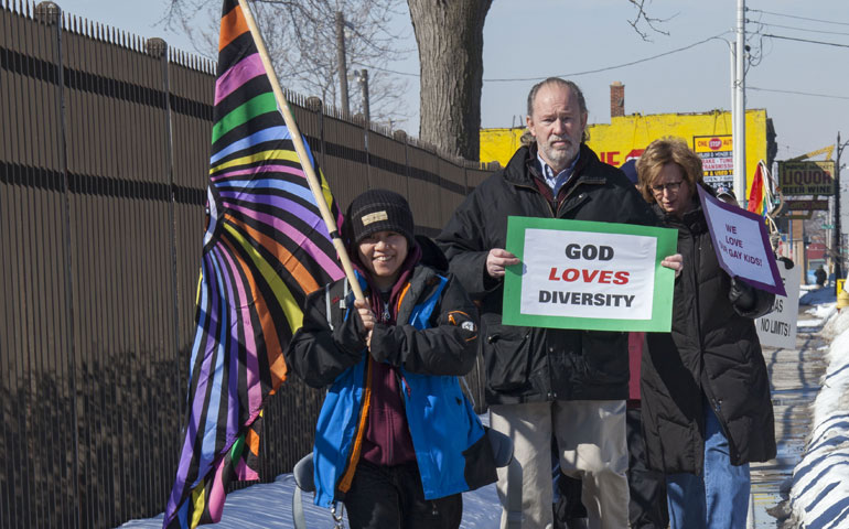 Members of Fortunate Families, a group of parents of LGBT children, hold a prayer vigil outside Sacred Heart Seminary in Detroit March 7. (Newscom/ZUMA Press/Jim West)