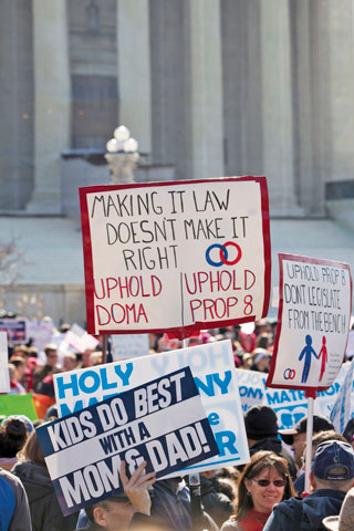 People demonstrate outside the Supreme Court building in Washington March 26 as justices hear arguments in a case challenging California’s same-sex marriage ban. (CNS/Nancy Phelan Wiechec)
