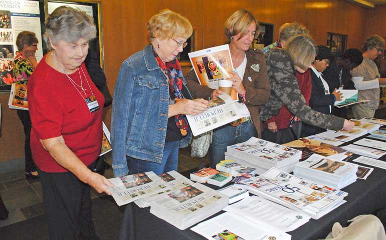 Conference attendees look at an array of NCR issues. (NCR photos/Jaratsri Piewklieng)