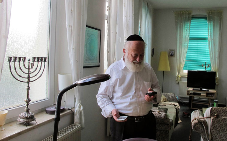 Rabbi David Goldberg stands in his office in the Jewish Community Center in 