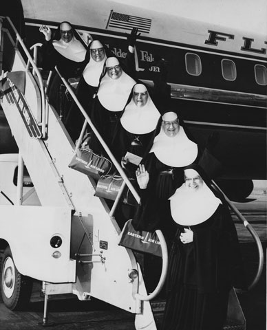 Mercy Sisters board a plane bound for Peru in a historical image shown in the documentary "Band of Sisters." (Sisters of Mercy Archives West Midwest-Chicago Community)