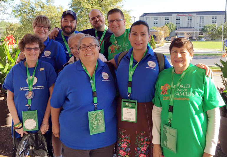 From left, Marcia Graber, Debbie Carpenter, Jason Hernandez, Mary Freml, Rosa Manriquez, Delfin Bautista, John Freml, Nicole Santamaria, and Vilma Santamaria (Photo by Ryan Hoffmann)