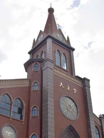 A Christian church in Lishui in China's Zhejiang province stands without a cross atop the building on July 9. (Newscom/Kyodo)