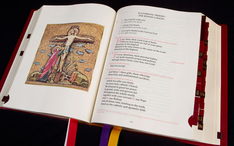 The first eucharistic prayer is seen on a page from a copy of the new Roman Missal in English published by the U.S. Conference of Catholic Bishops.
