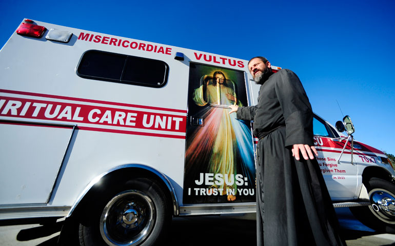 Fr. Michael Champagne talks about the Spiritual Care Unit, a mobile confessional made from a former ambulance, Nov. 23 at the Community of Jesus Crucified in St. Martinville, La. (©2015 The Acadiana Advocate/Leslie Westbrook)
