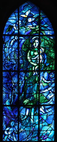 A stained glass window created by Jewish artist Marc Chagall with glassworker Charles Marq in 1974 depicts the Virgin and Child in Notre-Dame de Reims Cathedral in France. (Newscom/Manuel Cohen Photography/Manuel Cohen)