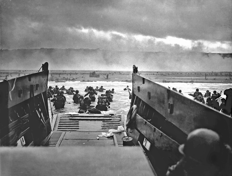  A LCVP (Landing Craft, Vehicle, Personnel) from the U.S. Coast Guard-manned USS Samuel Chase disembarks troops of the U.S. Army's First Division on the morning of June 6, 1944, at Omaha Beach, France. (Wikimedia Commons/Chief Photographer's Mate (CPHOM) Robert F. Sargent, U.S. Coast Guard)