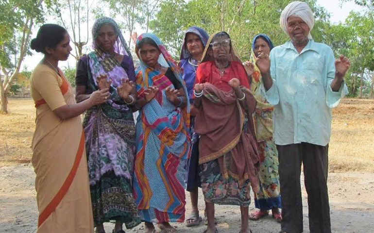 Sr. Julia Thundathil interacts with people living with Hansen's disease at Harsha Nagar, an enclave for leprosy patients in central India. (GSR/Saji Thomas)