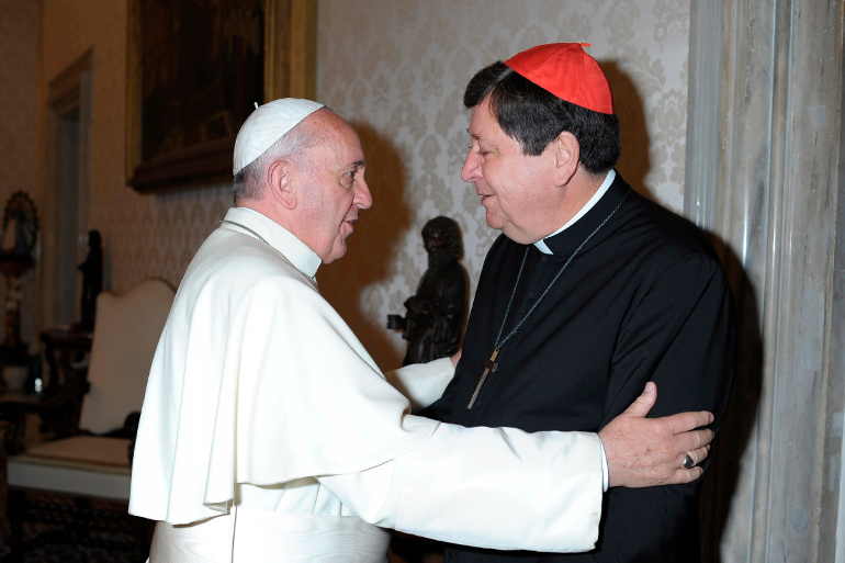 Pope Francis greets Brazilian Cardinal Joao Braz de Aviz, prefect of the Congregation for Institutes of Consecrated Life and Societies of Apostolic Life, during a private audience at the Vatican Oct. 5, 2013. (CNS/Reuters/L'Osservatore Romano) 