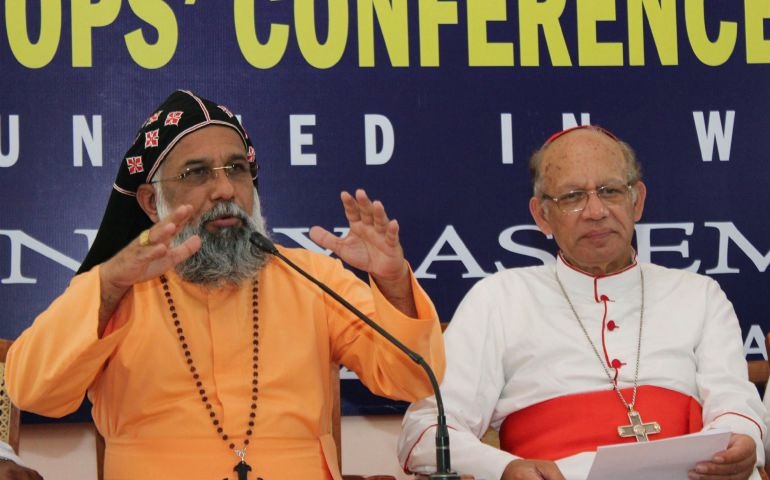 Cardinal Baselios Cleemis, left, and Cardinal Oswald Gracias speak during a 2014 news conference in Palai, India. (CNS/Anto Akkara)