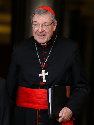 Cardinal George Pell of Sydney leaves a meeting of cardinals with Pope Francis in the synod hall at the Vatican Feb. 20. The Vatican announced Feb. 24 that Pell has been appointed by Pope Francis to head a new Vatican office overseeing Vatican finances. (CNS/Paul Haring)