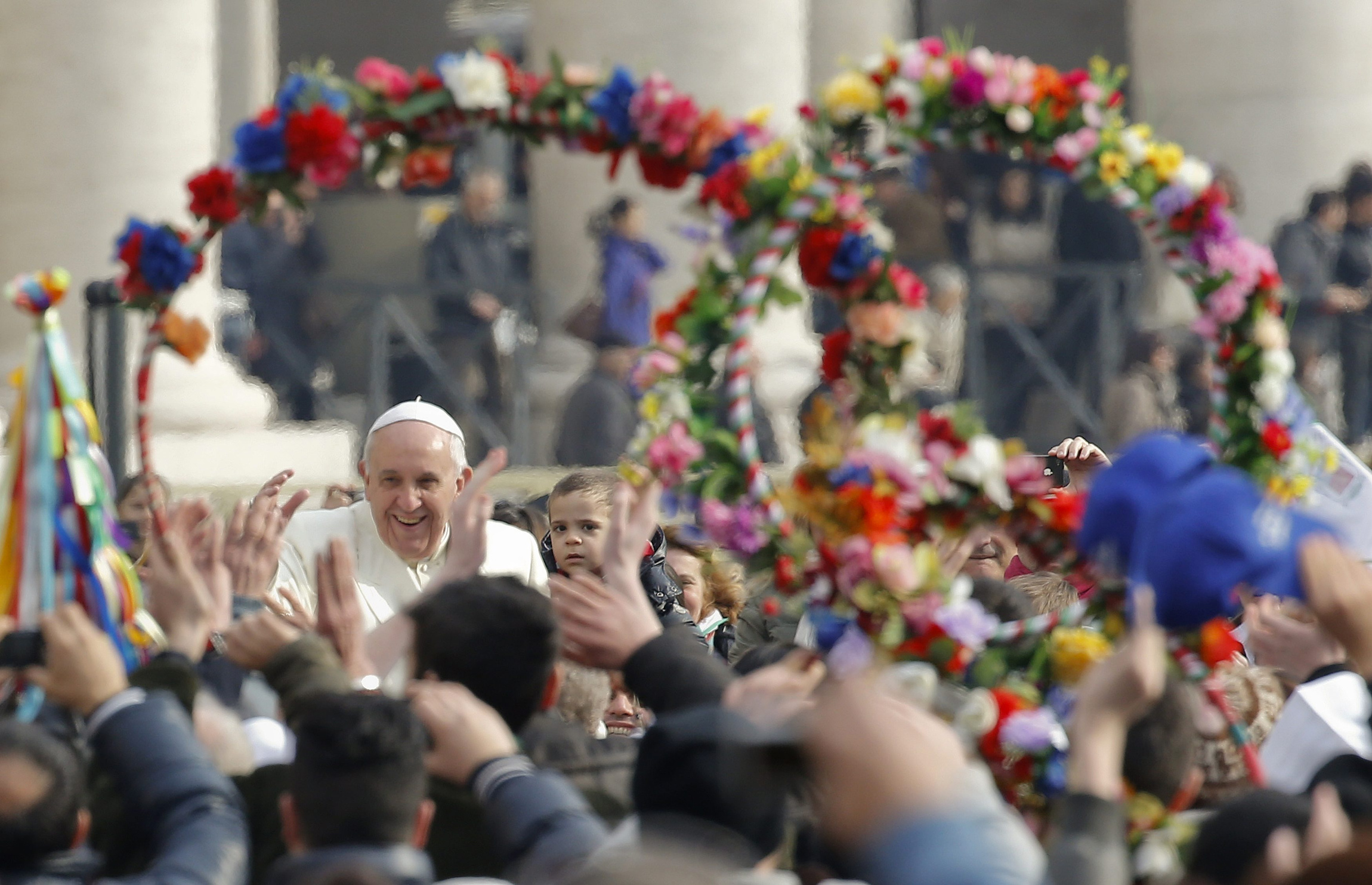 Pope Francis smiles as he arrives to lead his general audience in St. Peter's Square at the Vatican Feb. 26. (CNS photo/Tony Gentile, Reuters) (Feb. 26, 2014)