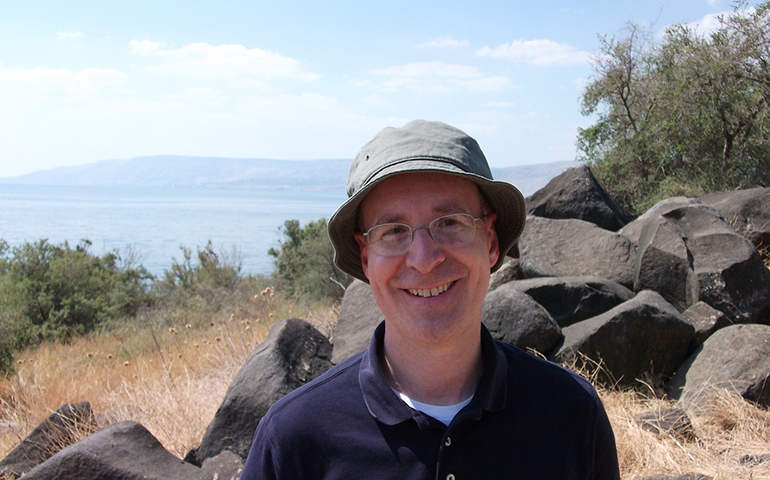 Jesuit Fr. James Martin is pictured in 2011 by the "Bay of Parables" at the Sea of Galilee. (CNS photo/courtesy James Martin)
