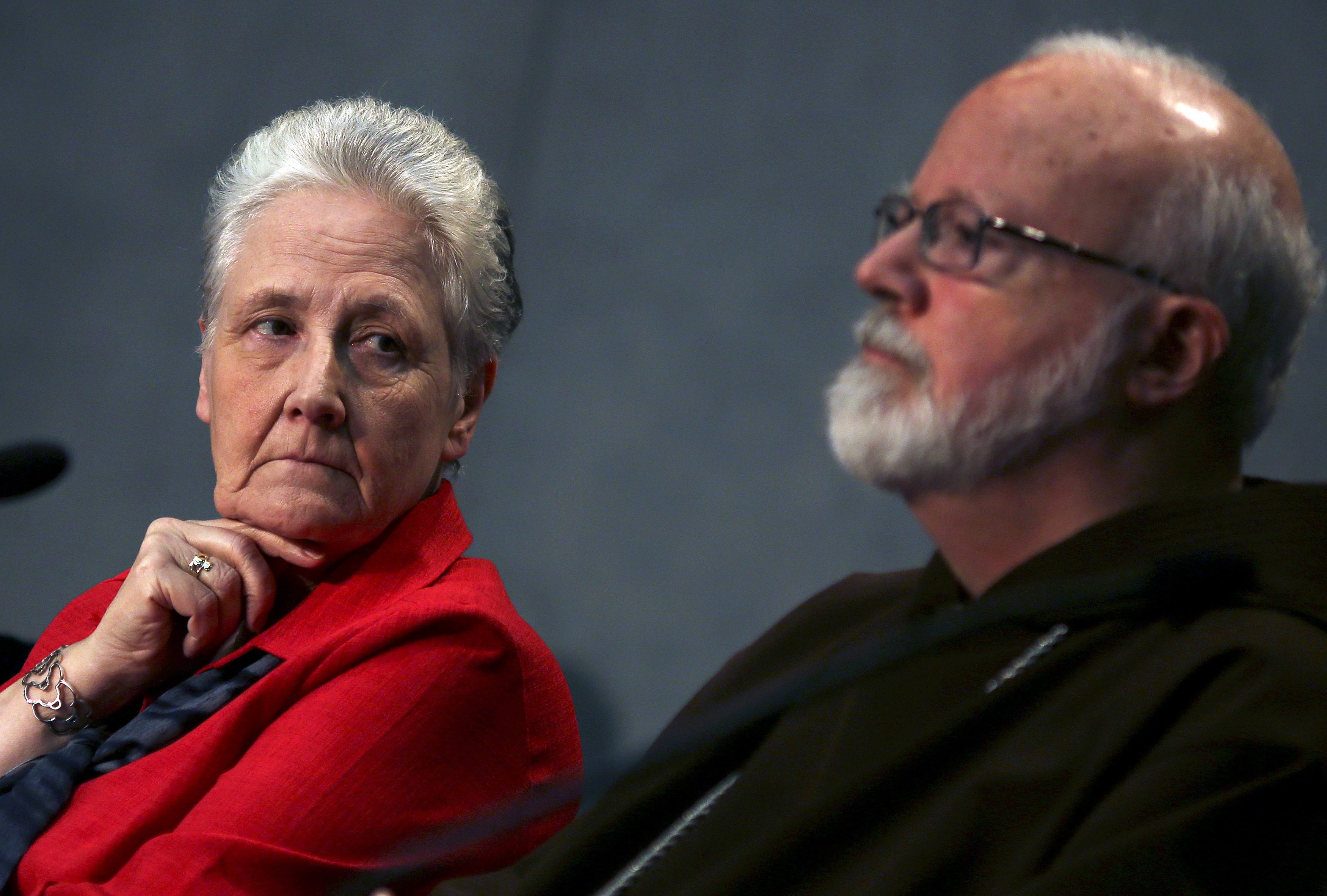 Irish abuse victim Marie Collins, a clerical abuse survivor nominated by Pope Francis to sit on the new Pontifical Commission for the Protection of Minors, looks at Boston Cardinal Sean O'Malley during their first briefing at the Holy See press office at the Vatican in May 2014. (CNS/Reuters/Alessandro Bianchi)