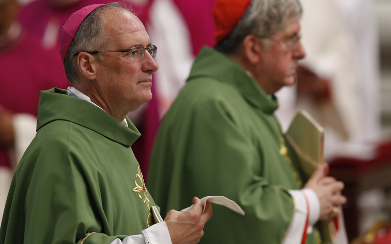 Archbishop Paul-Andre Durocher, left, in a 2014 file photo (CNS/Paul Haring)