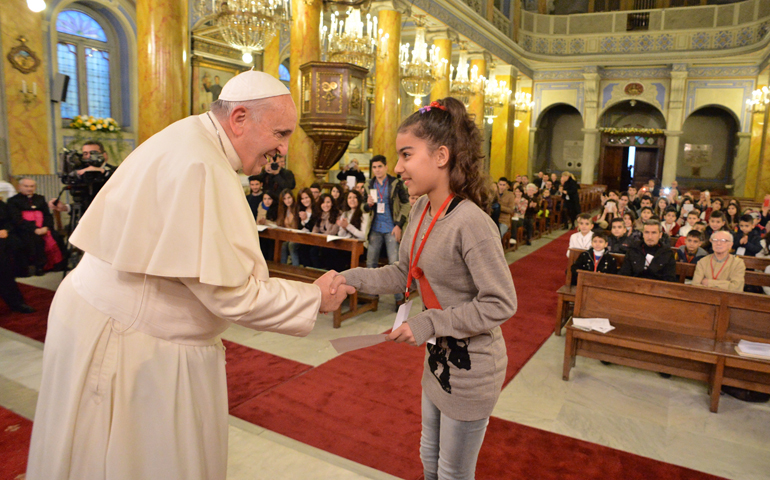 Pope Francis meets with young refugees from civil wars in Syria and Iraq, Nov. 30, 2014 in Instanbul. (CNS photo/L'Osservatore Romano)