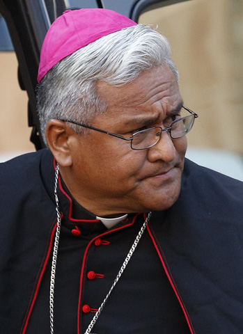 Bishop Soane Patita Paini Mafi of Tonga, an archipelago nation in the southern Pacific Ocean, arrives for the opening session of the extraordinary Synod of Bishops on the family at the Vatican in this Oct. 6, 2014, CNS file photo. Mafi, 53, was one of 20 new cardinals named by Pope Francis. (CNS photo/Paul Haring)